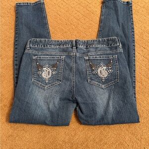 Women’s dark wash low rise Guess skinny jeans size 32